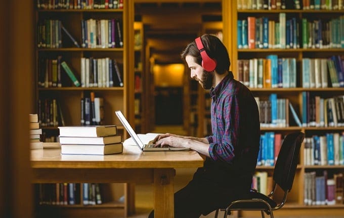 Man Studying In Library