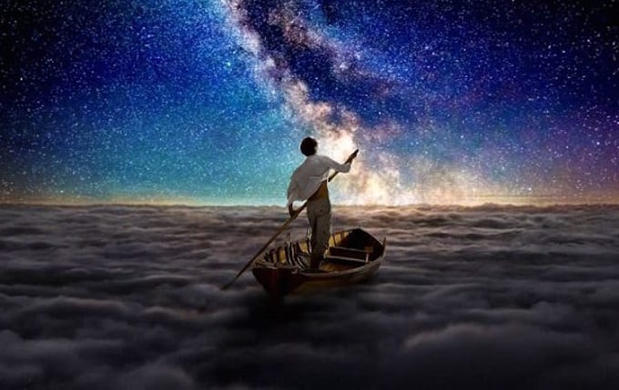Man Sailing Above The Clouds