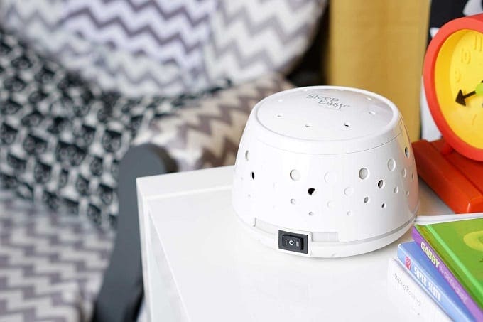 White Noise Machine On Night Stand