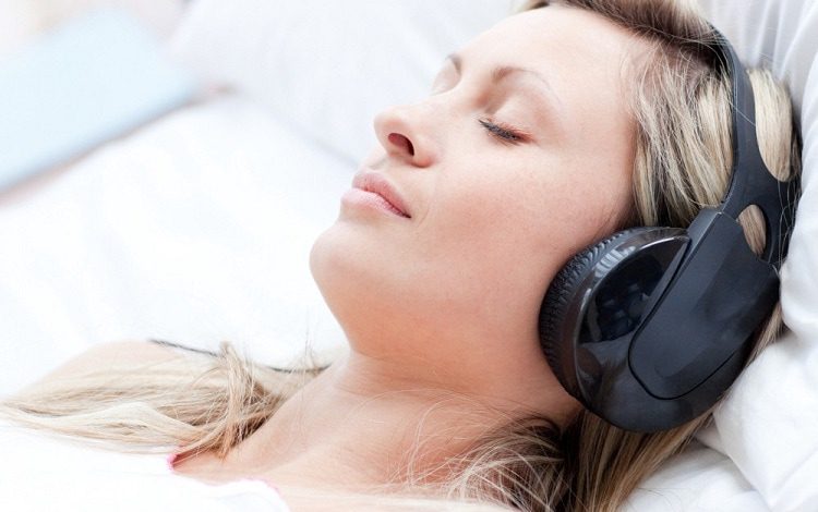 young woman listen relaxing music