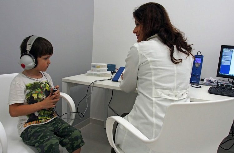 boy at hearing therapy