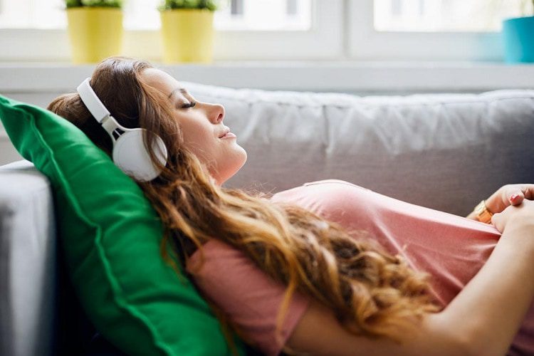 Woman Relaxing With Music
