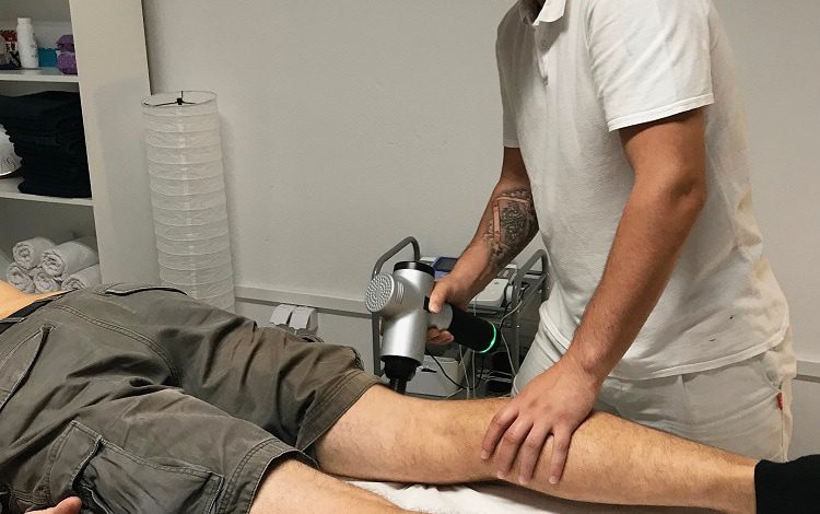leg pain relief with massage gun