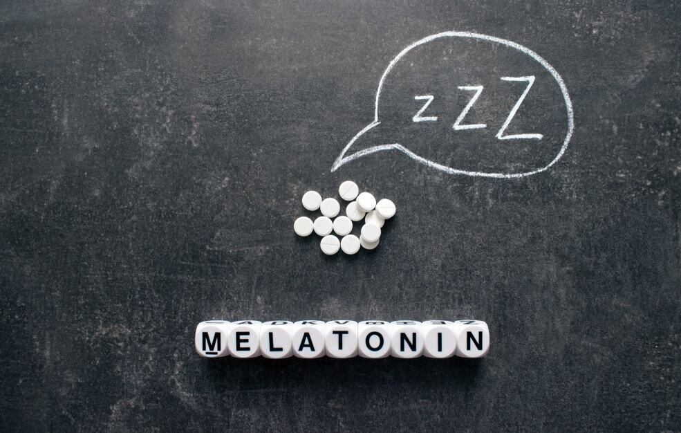 melatonin on dark night background