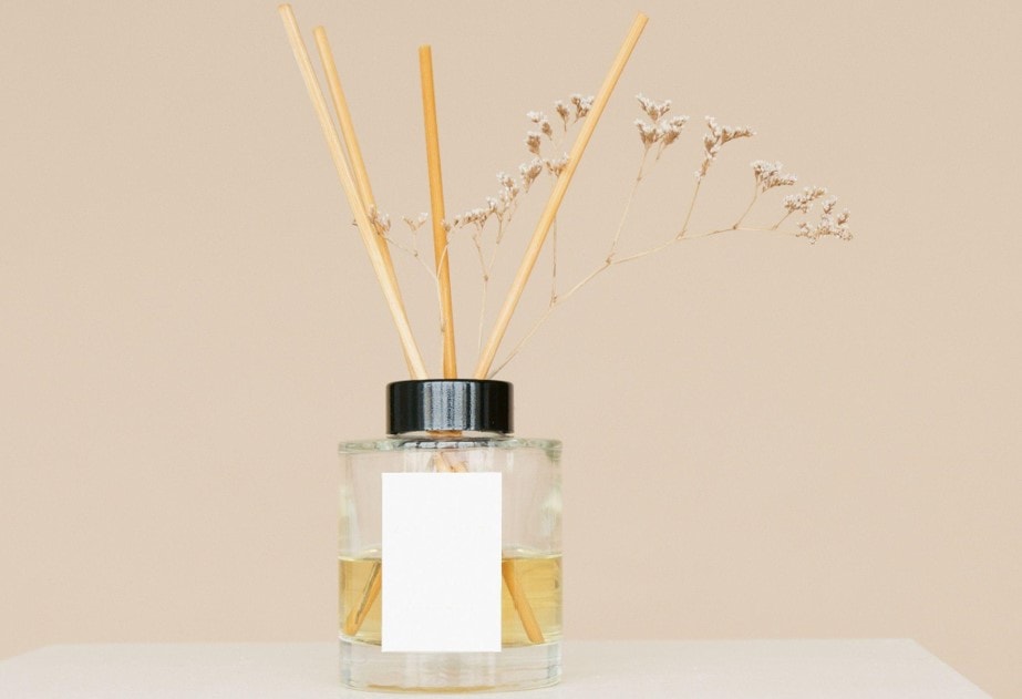 reed diffuser on a white table