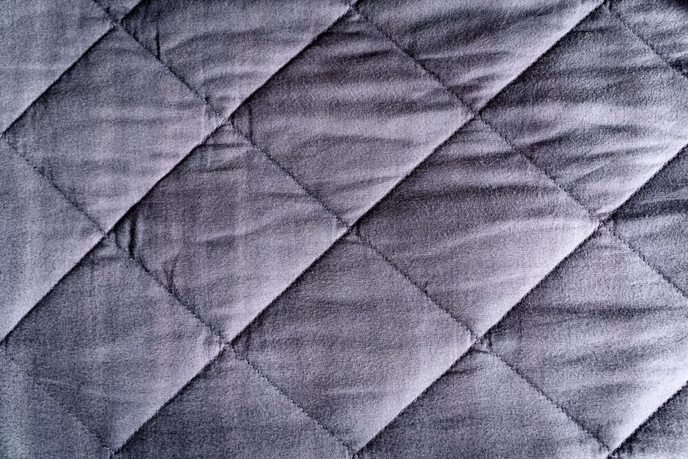 blue weighted blanket texture detail