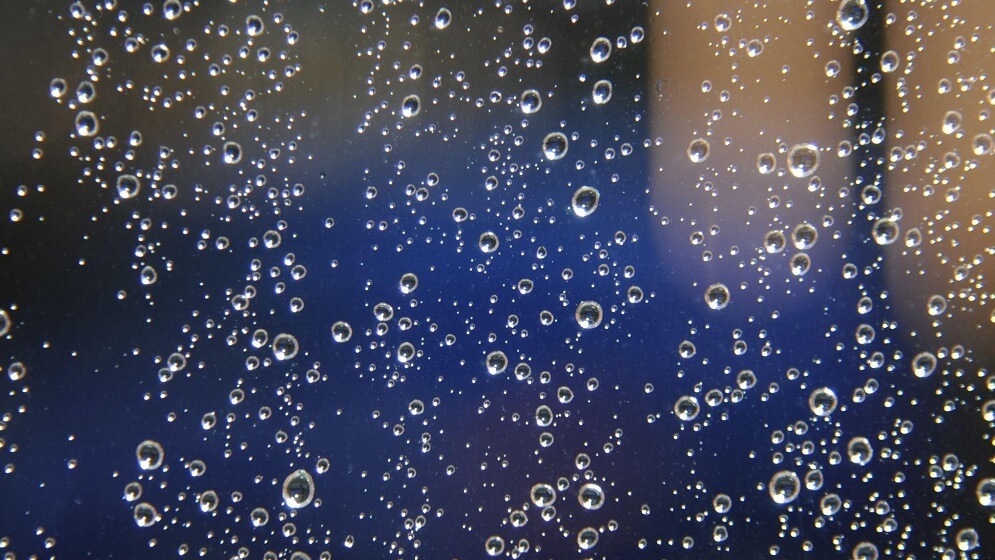 Rain on the window with a blurred background